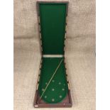 A Victorian mahogany folding table-top bagatelle board, 48 x 99 x 13 cm high (closed)