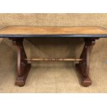 A Victorian mahogany writing table, having a marquetry inlaid and cross-banded satinwood top with