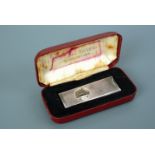 An Elizabeth II silver cigar cutter, in original case, 21.7 g