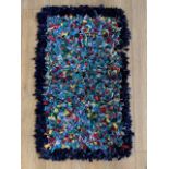 A handmade clippy / proggy rag mat, 100 x 60 cm (a/f)