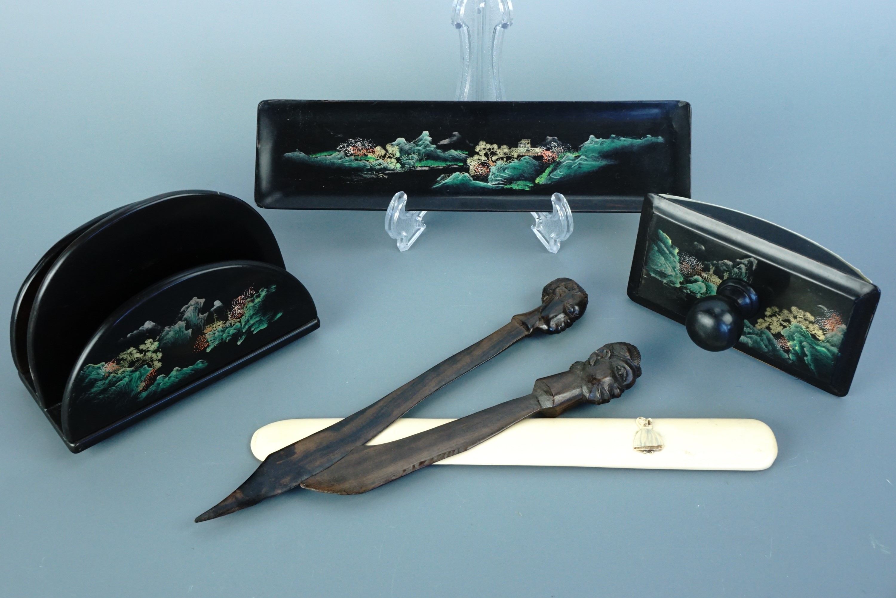 A black Japanned desk set and paper knives