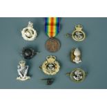 Staybrite and other British army, Royal Marines and Royal Navy cap badges together with a replica