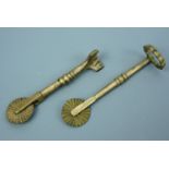 Two Victorian brass pastry jiggers