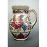 A Charlotte Rhead for Crown Ducal Ankara pattern flower jug, decorated in tones of pink, rose, green