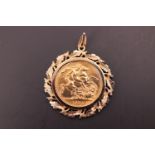 A 1974 sovereign in 9 ct gold floral pendant mount