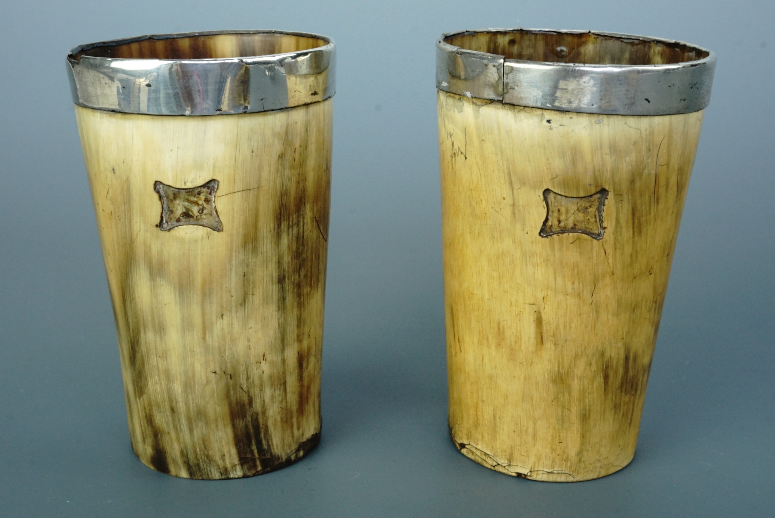 A 19th Century pair of white metal mounted horn beakers, 11 cm - Image 2 of 2