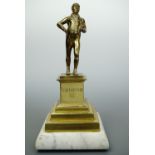 A George III brass figure, 24 cm