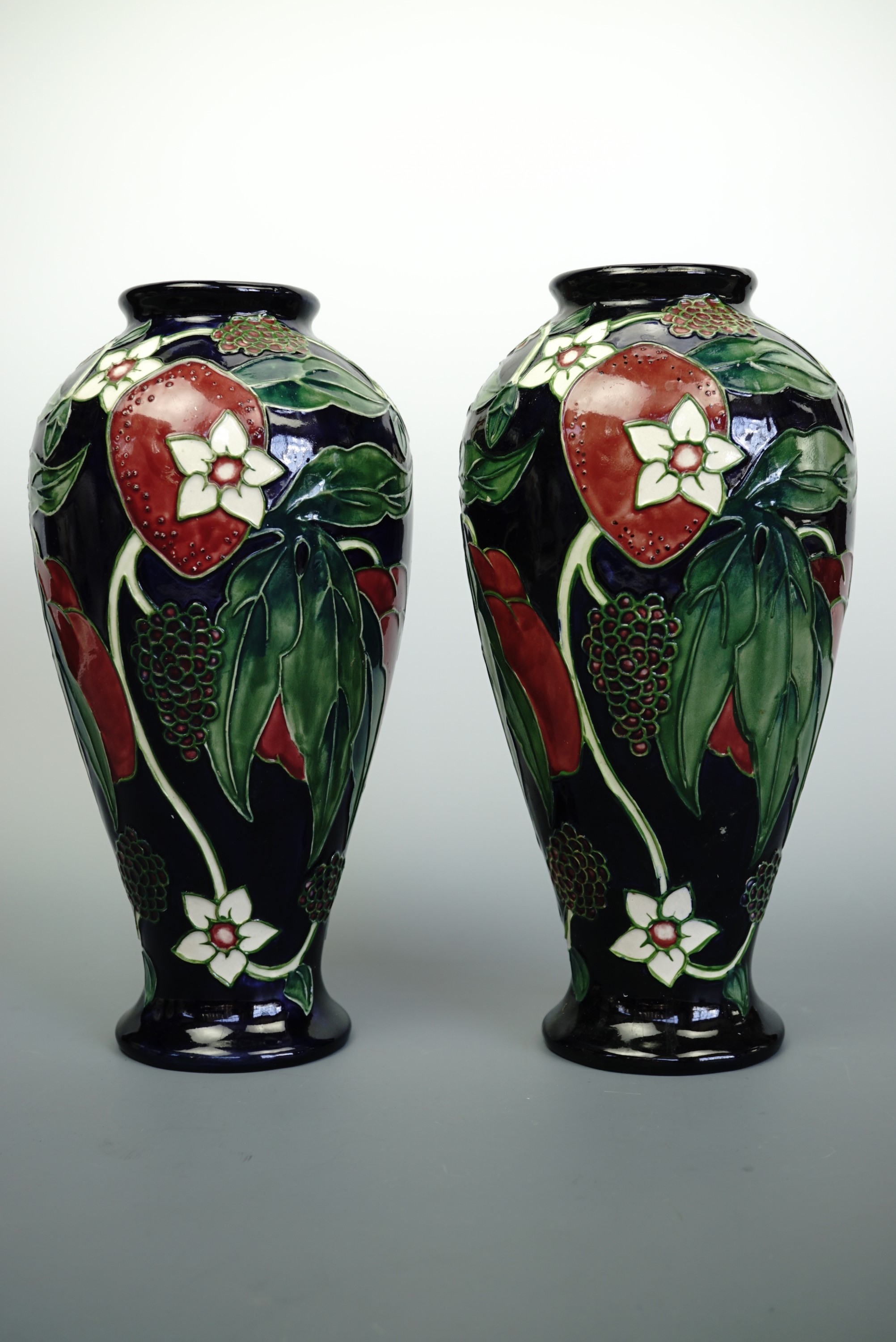 A pair of Country Craft vases by Anne Rowe, 29 cm high (free of damage)