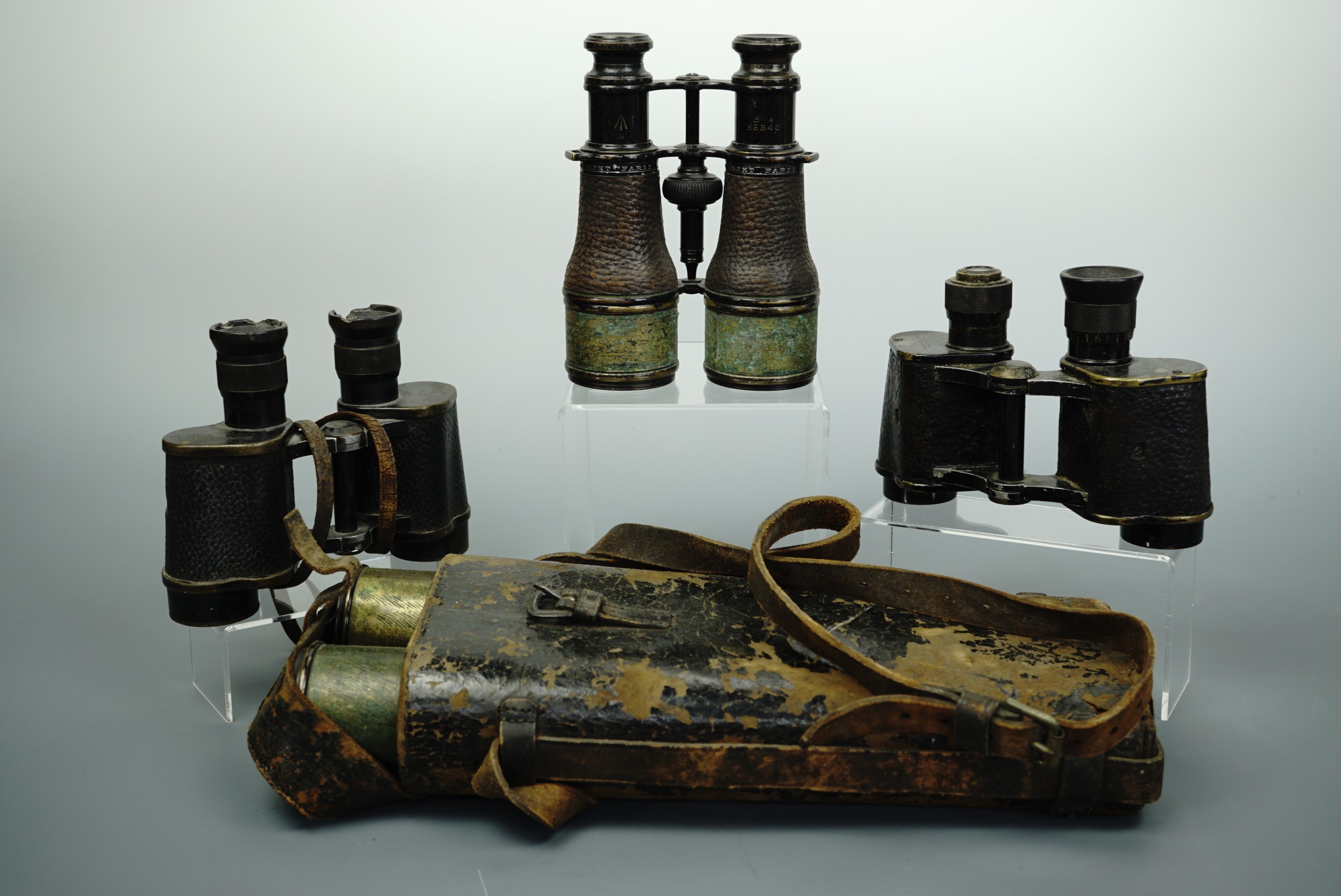 Two sets of Great War British army binoculars together with 1940 dated No 2 prismatic prismatic