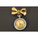 A Belle Epoque lady's basse taille enamelled white metal fob watch and ribbon-bow suspender