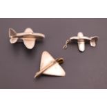 Two hand-made RAF sweetheart brooches and a pendant, each in the form of an aircraft, one a