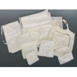 Antique whitework embroidered lingerie or pyjama cases, together with similar other cases for