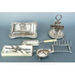 A quantity of antique electroplate, including a vegetable tureen, toast rack, sauce boat, egg cup
