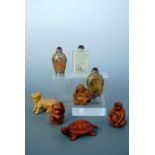A collection of modern Japanese netsuke and snuff bottles
