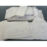 A quantity of antique whitework hand cloths / towels, including some finely embroidered examples