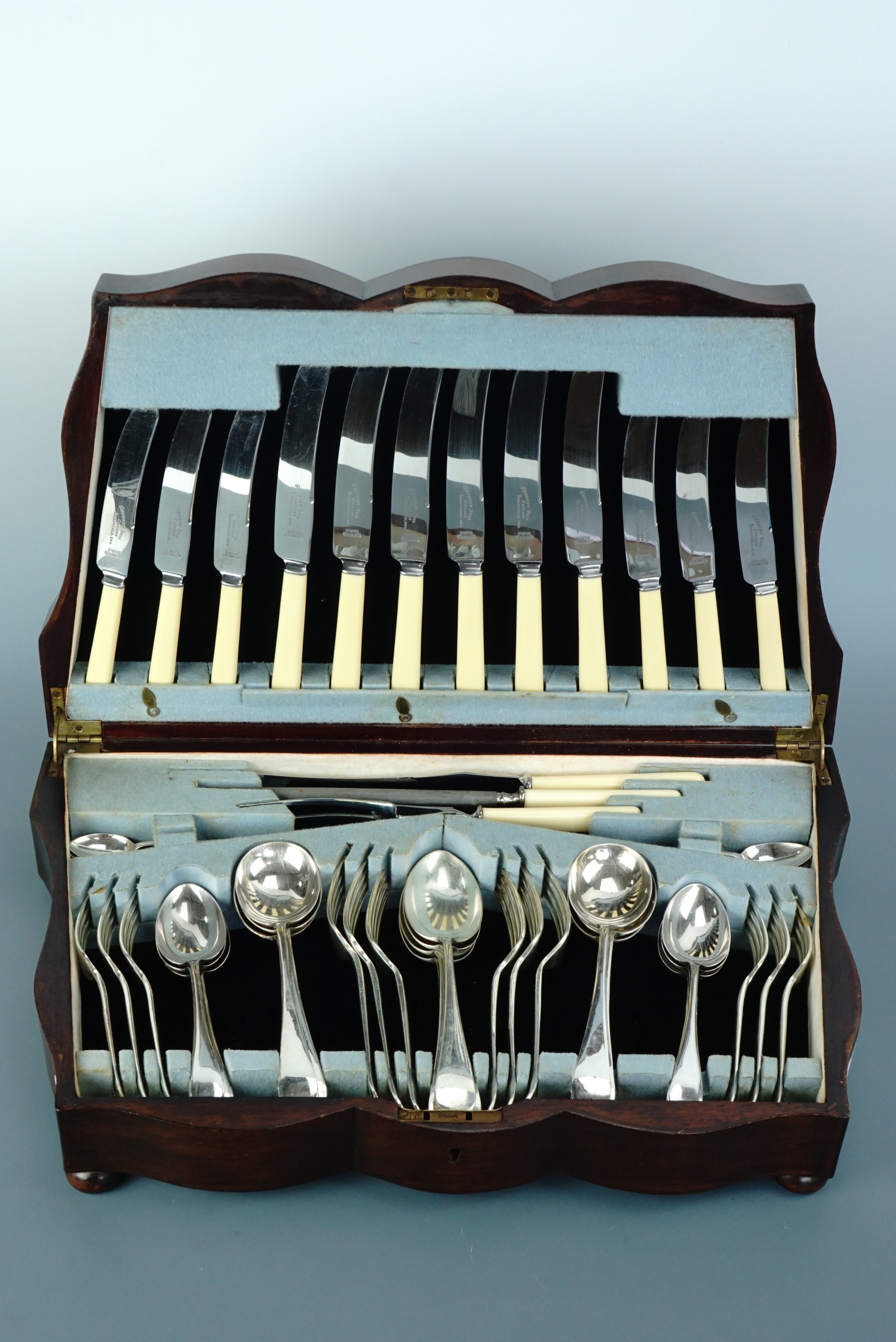 A 1930s mahogany canteen of "Beehive" electroplate cutlery