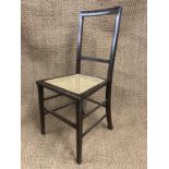 A late 19th / early 20th Century cane seated oak bedroom chair