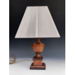 A contemporary turned and part ebonised baluster table lamp, 32 cm excluding shade.