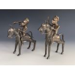 Two Benin style electroplate figures of mounted tribal horsemen, 23 cm