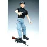 An Action Man figure, together with clothing etc