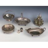 A quantity of Victorian and later electroplate including a swing-handled basket and egg cups on
