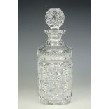 A heavy cut glass spirit decanter, of distinctive form, 27 cm