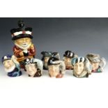 Seven Royal Doulton character jugs together with a kitsch Beefeater character lamp, lamp 24 cm