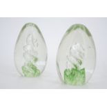 Two studio glass paperweights, 11 cm