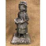 A weathered pre-cast garden statue of a young girl with bowl, 72 cm