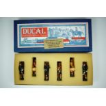 A boxed set of six Ducal Miniatures die-cast lead toy soldiers, highland bandsmen, 54 mm.