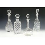Four Victorian and later cut glass decanters