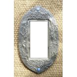 An early 20th Century Arts and Crafts pewter framed wall mirror with blue Ruskin type cabochons,