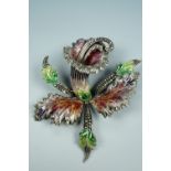 An uncommonly large and flamboyant enamelled and marcasite-set white metal brooch in the form of