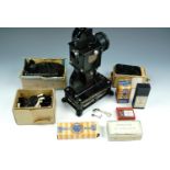 A 1920s Pathescope film projector and accessories