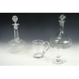 A contemporary free blown ship's decanter, a Victorian finely cut shaft and globe decanter and wheel