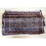 A oriental rug, 220 cm x 115 cm