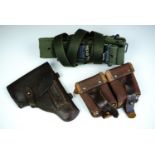 Military webbing belts, ammunition pouches and a holster