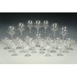 A set of Orrefors "Anne" pattern glasses, with clear spiral twist stems, comprising twelve champagne
