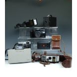 Various cameras including a Bell and Howell 624EE Autoset Cine Camera, a No.2 Kodak Brownie, an