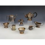 A quantity of electroplate including a three-piece tea set, gravy boat and small jug etc