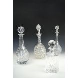 A Victorian heavy hobnail-cut decanter and three others, including a Carlisle Golf Club spirit