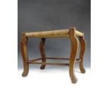 A string-seated oak stool, circa 1930s