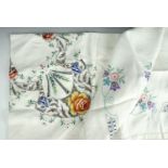 Two antique embroidered tea table cloths, one decorated with cut-work and long and short stitch