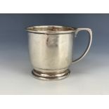 A George V silver christening cup, bearing the name of the recipient, William Hair Haseler,