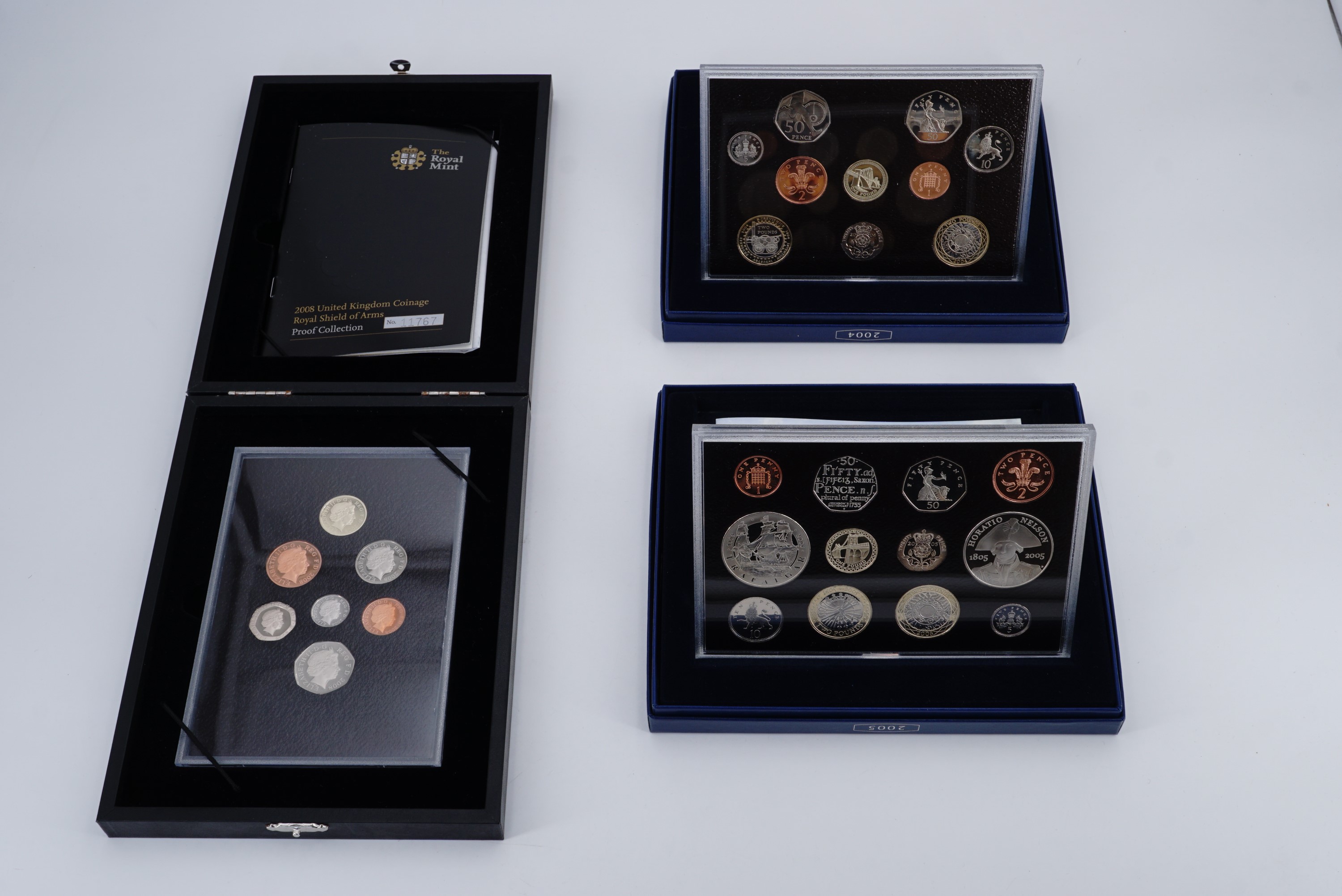Two Royal Mint United Kingdom Proof Coin Sets, for the years 2004 and 2005, with original