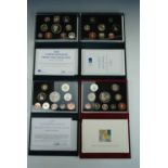 Four Royal Mint United Kingdom Proof Coin Collections, for the years 1998, 1997, 1995 and 1999, with