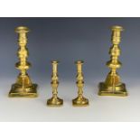 A pair of Victorian brass candle sticks and taper sticks, tallest 20cm.