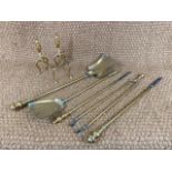 Brass andirons and fire hearth implements