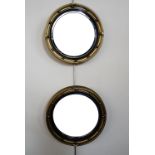 A pair of old reproduction Regency style gilt framed circular wall mirrors, 24 cm