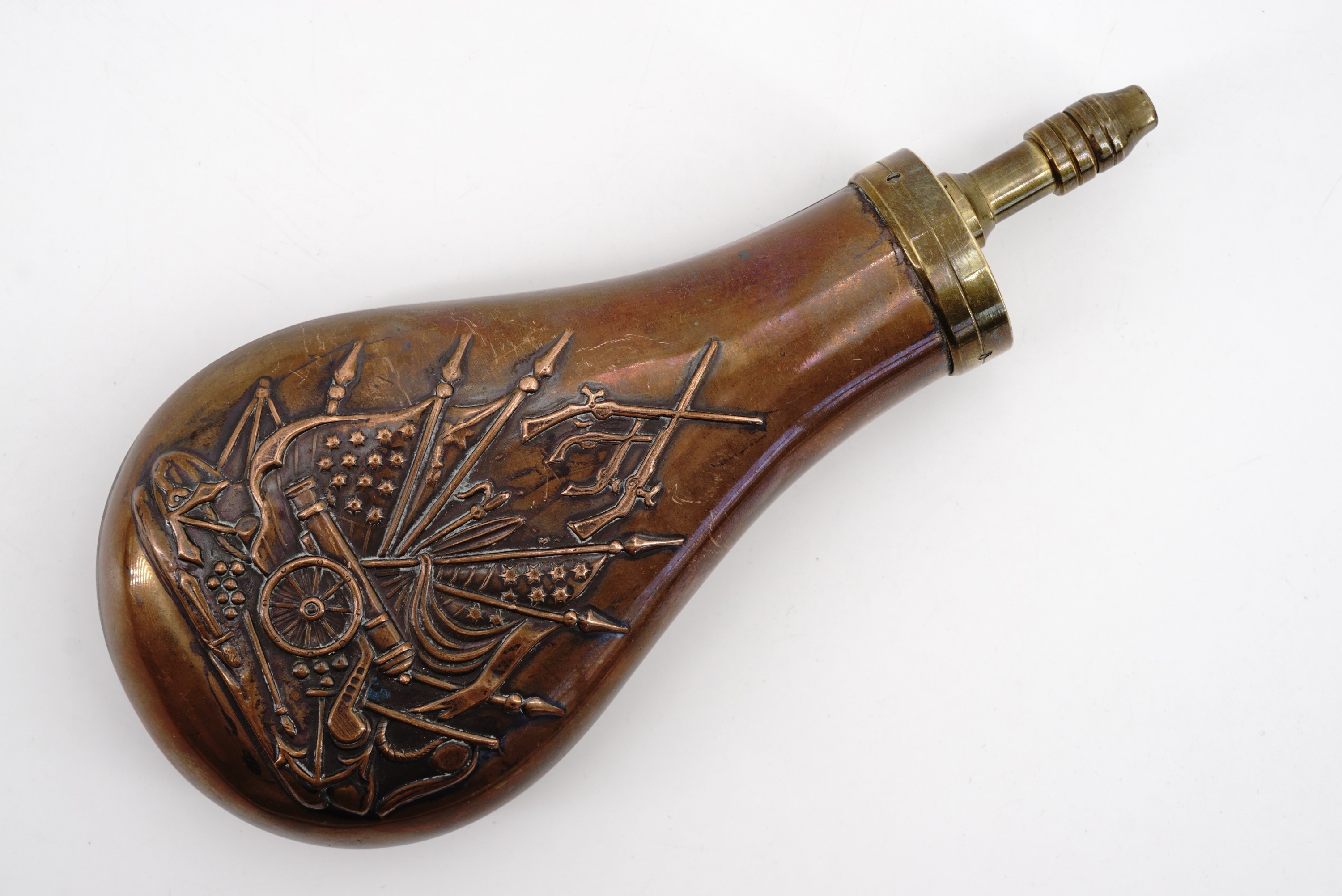 A reproduction Colt's patent powder flask